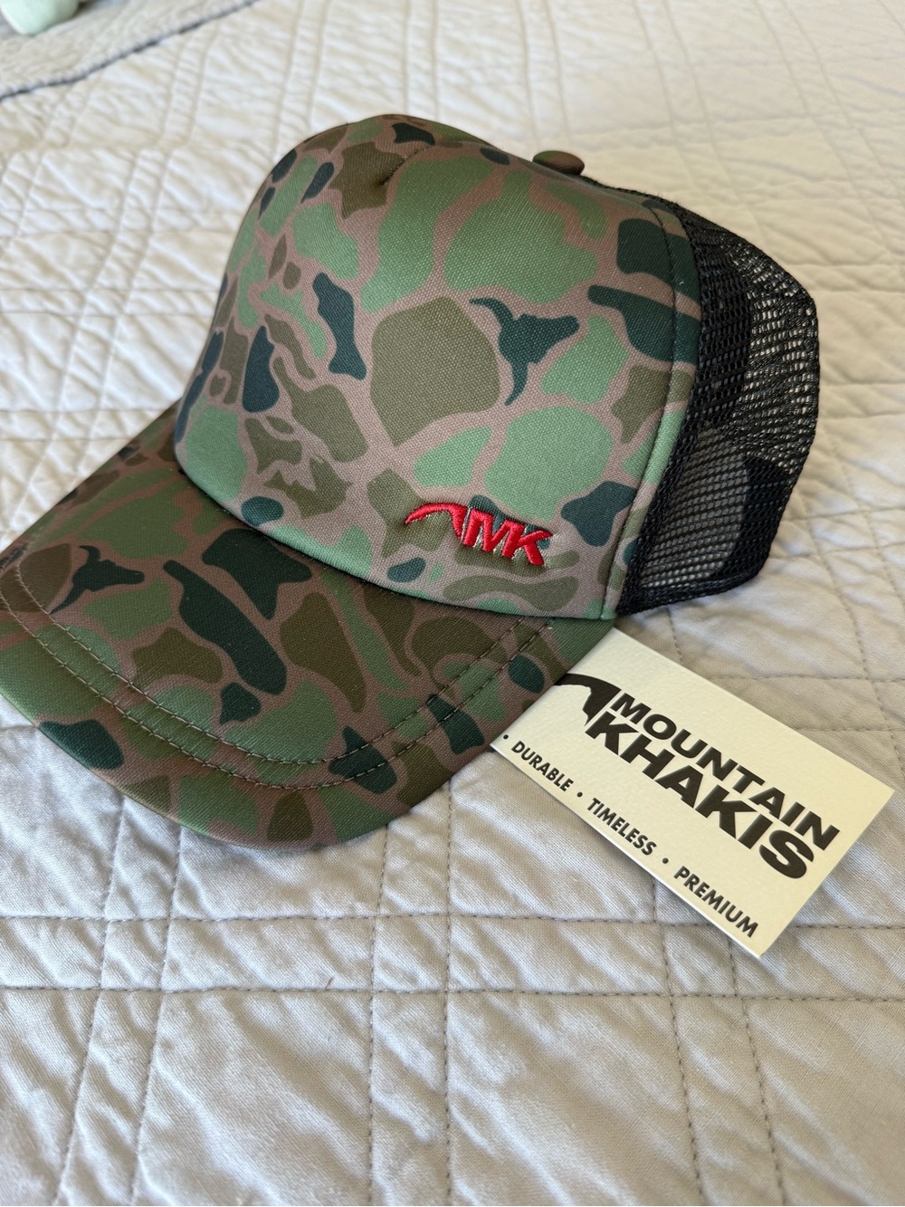 Mountain Khakis Camo Trucker Hat - Green with Black Mesh and Red Logo